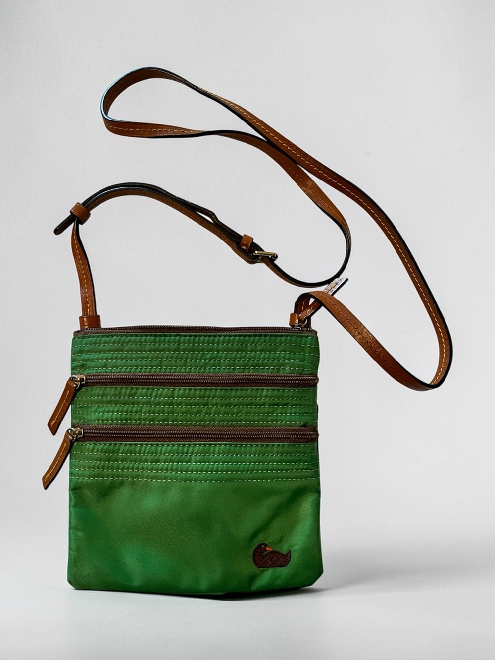 Dooney & Bourke Green Crossbody with Brown Trim and Adjustable Strap